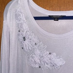 Light purple top with floral and gem pattern